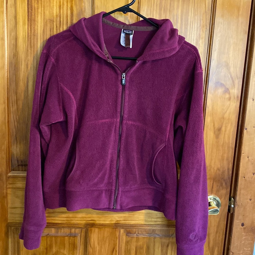 Women’s Patagonia purple fleece jacket.